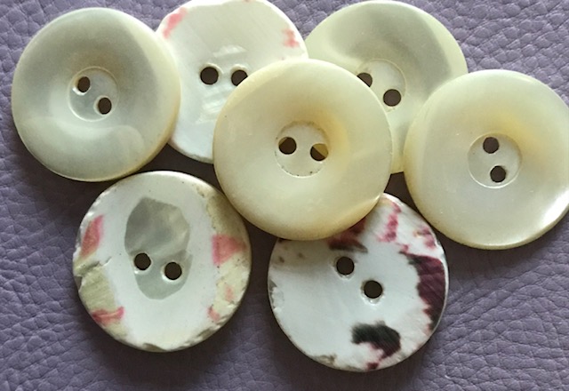 One Mother of Pearl Ivory 24mm 2H Buttons